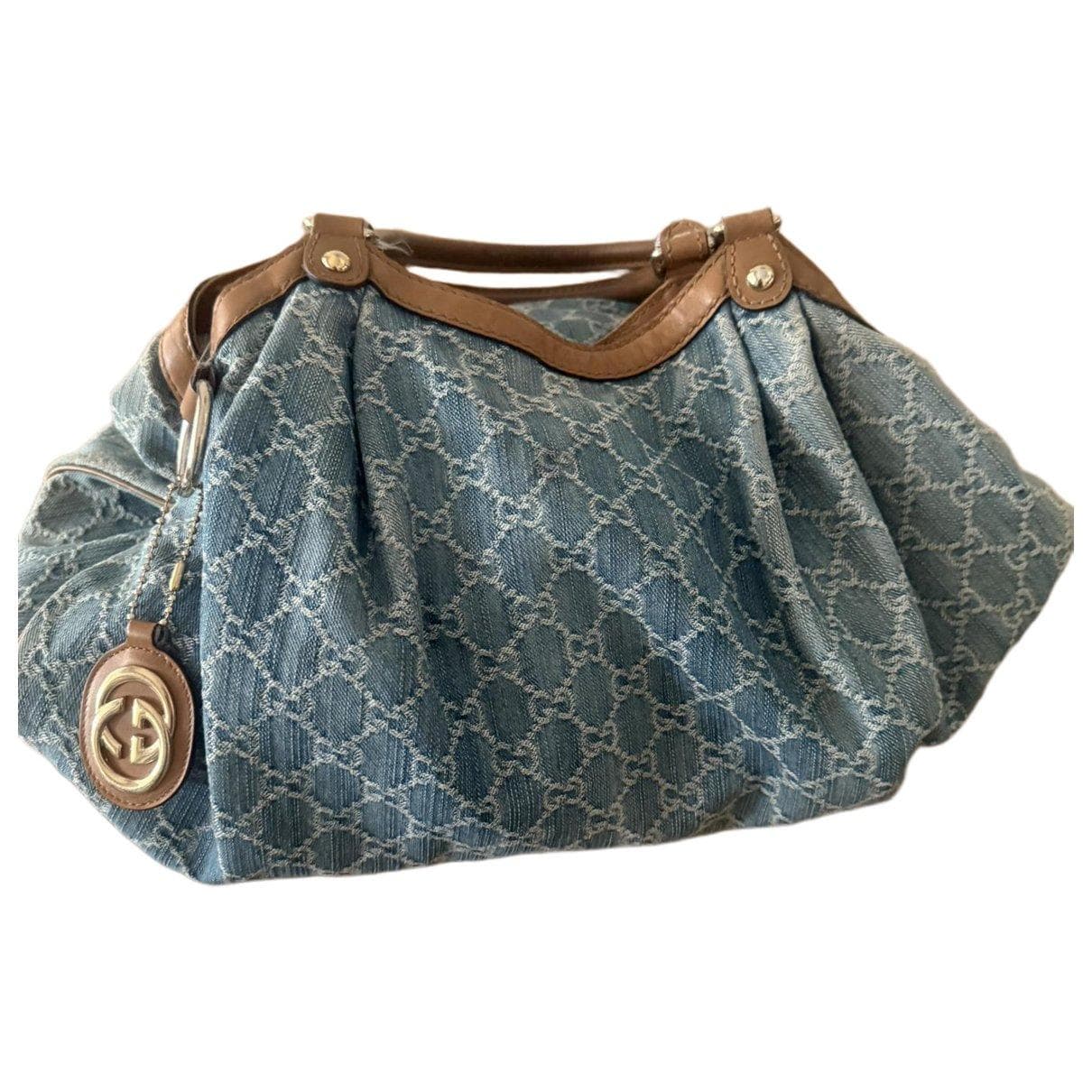 Bolsos de lujo autenticados en Loué